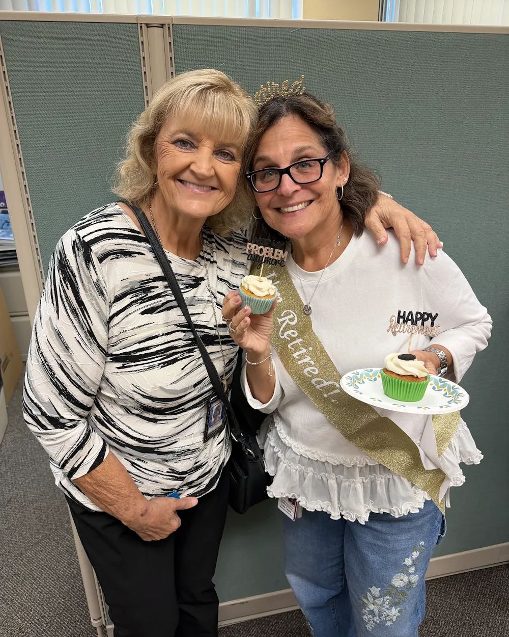 Chris Reid's team marking a retiring educator's last day with her colleague